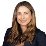 Professional headshot of smiling woman in dark blazer