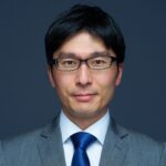 Man in gray suit and blue tie portrait