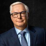 Older man in suit and glasses portrait